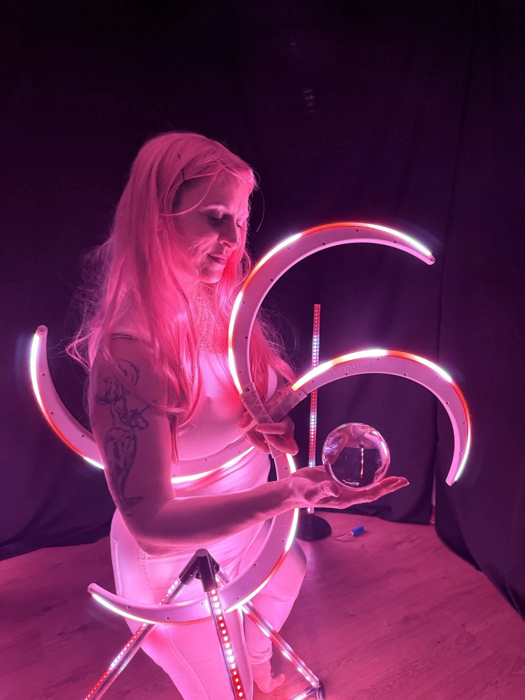 Bella with pink LED props and a clear ball